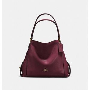 Coach Edie 31 shoulder bag.  Oxblood color